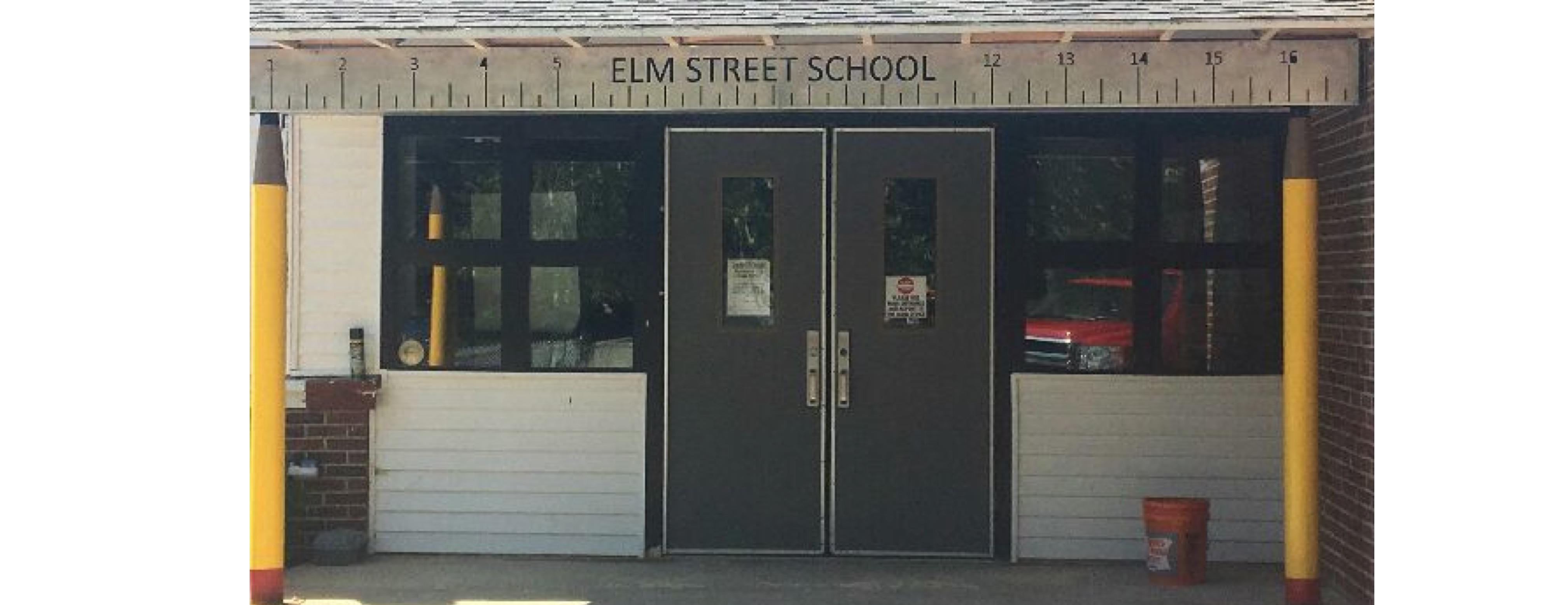Photo of the pencils and ruler used in decor at the front of Elm Street School. Very cool!