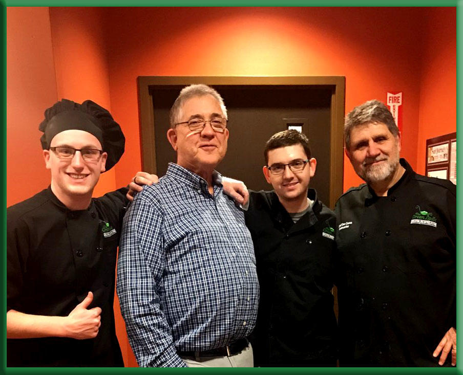 Photo of school board member Norm Beauparlant with students Corbin Chamberlain and Jarrett Golding-Timberlake, and Chef Dan Caron.
